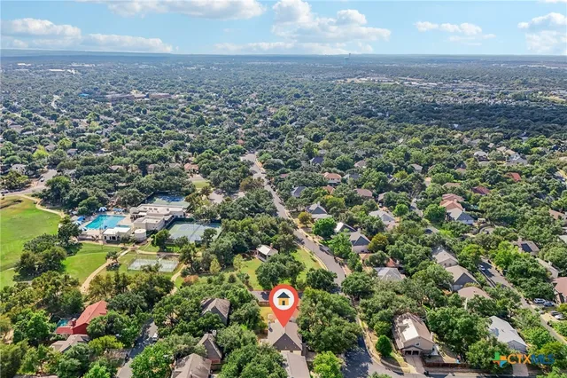 a view of a chairs and table on the terrace