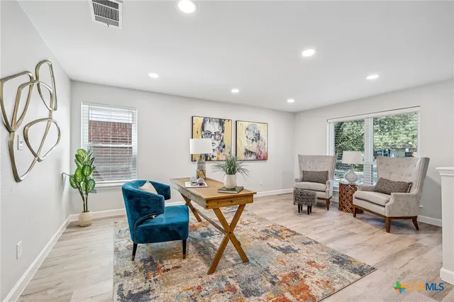 a outdoor living space with furniture and a window