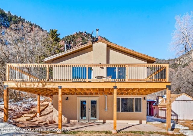 a view of a house with a street view