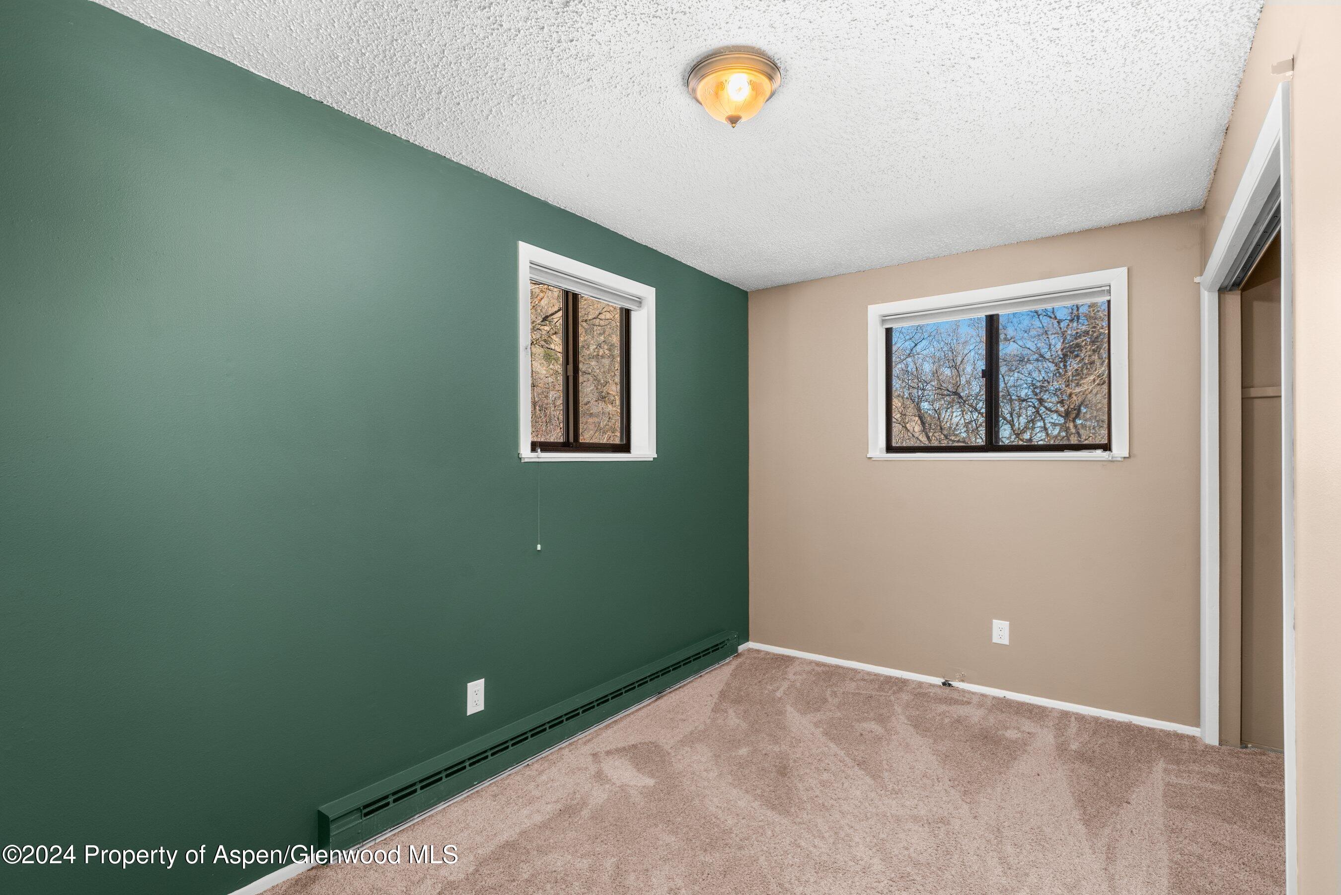 212 Cherokee Lane Carbondale, CO 81623 - Photo 20 of 34 a view of a hallway with a window