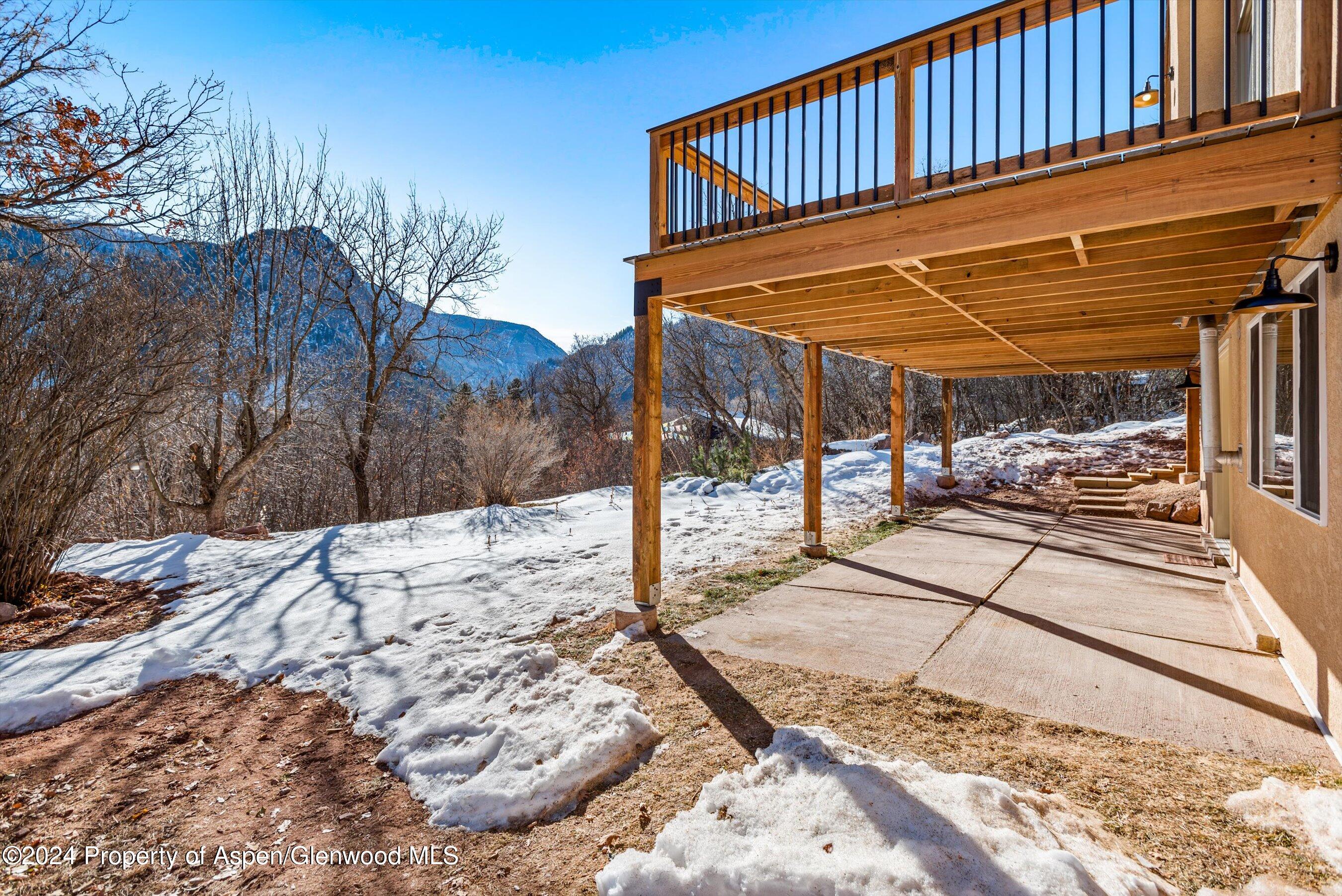 212 Cherokee Lane Carbondale, CO 81623 - Photo 27 of 34 a view of a backyard of the house