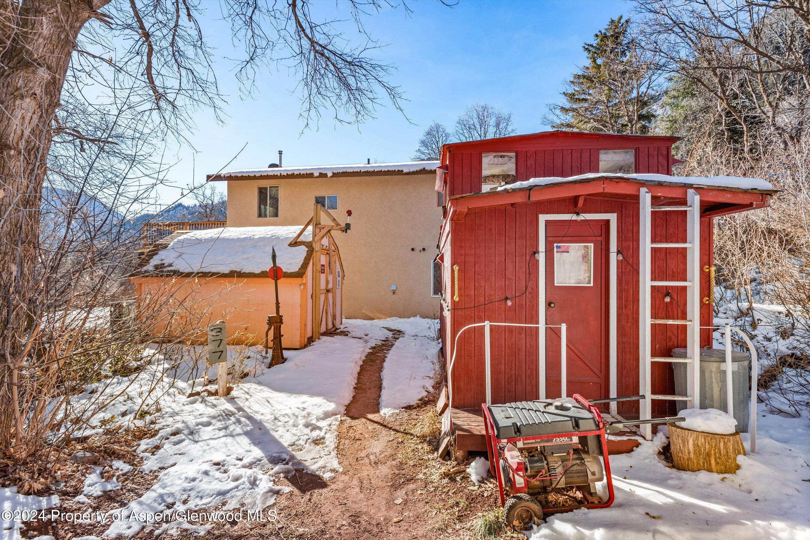 212 Cherokee Lane Carbondale, CO 81623 - Photo 29 of 34 a front view of a house with basket ball court