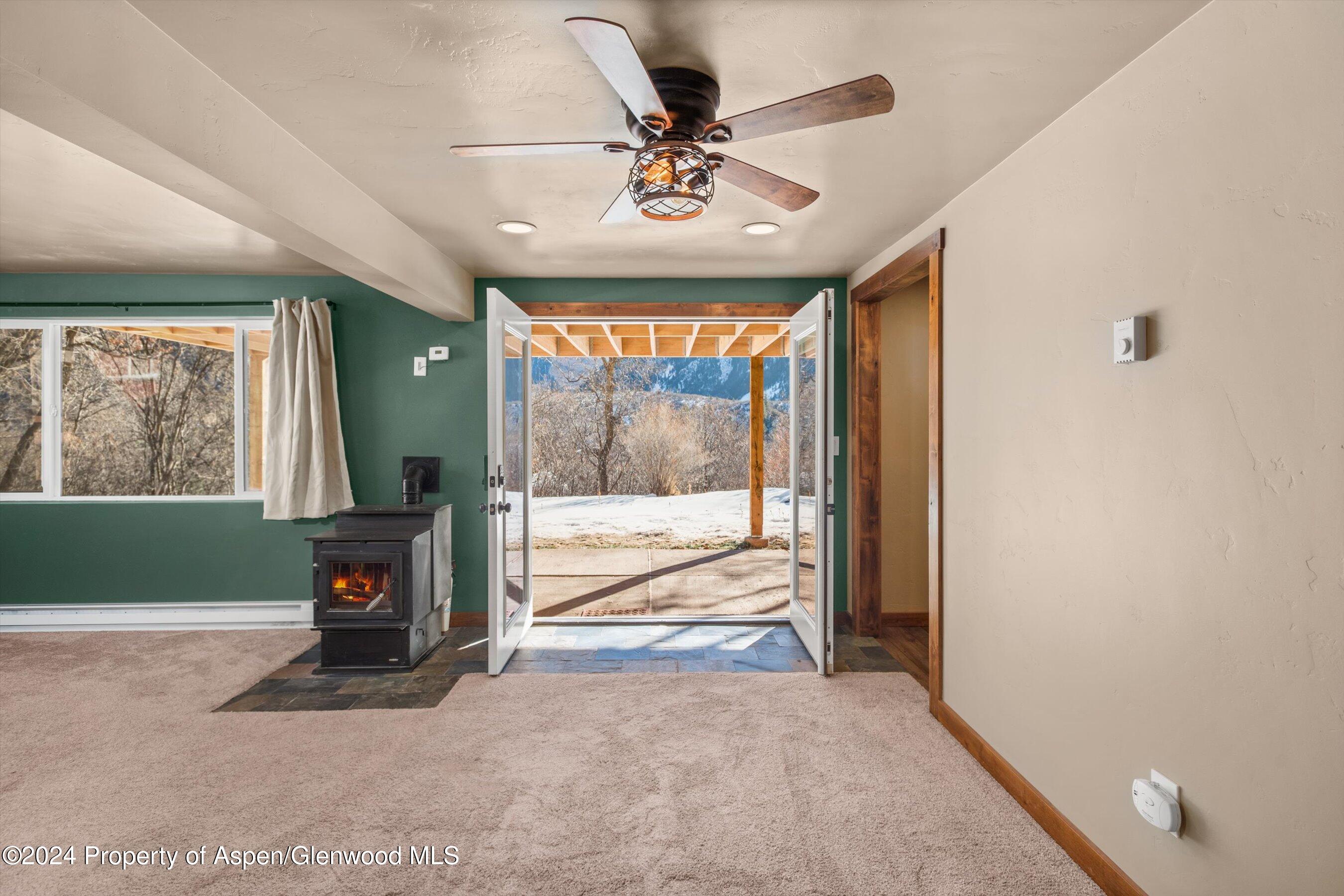 212 Cherokee Lane Carbondale, CO 81623 - Photo 3 of 34 a living room with a large window