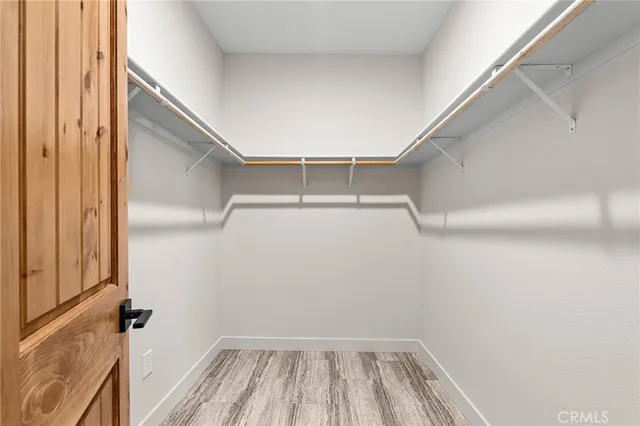 a view of a room with racks on the wall