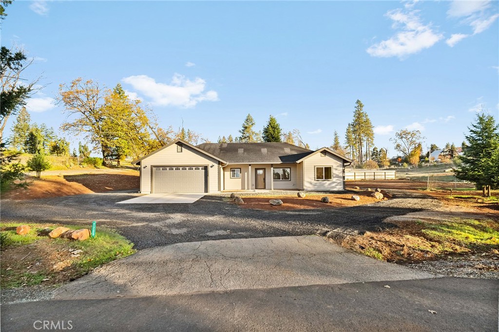 2235 Stearns Road Paradise, CA 95969 - Photo 2 of 42 a front view of a house with a yard