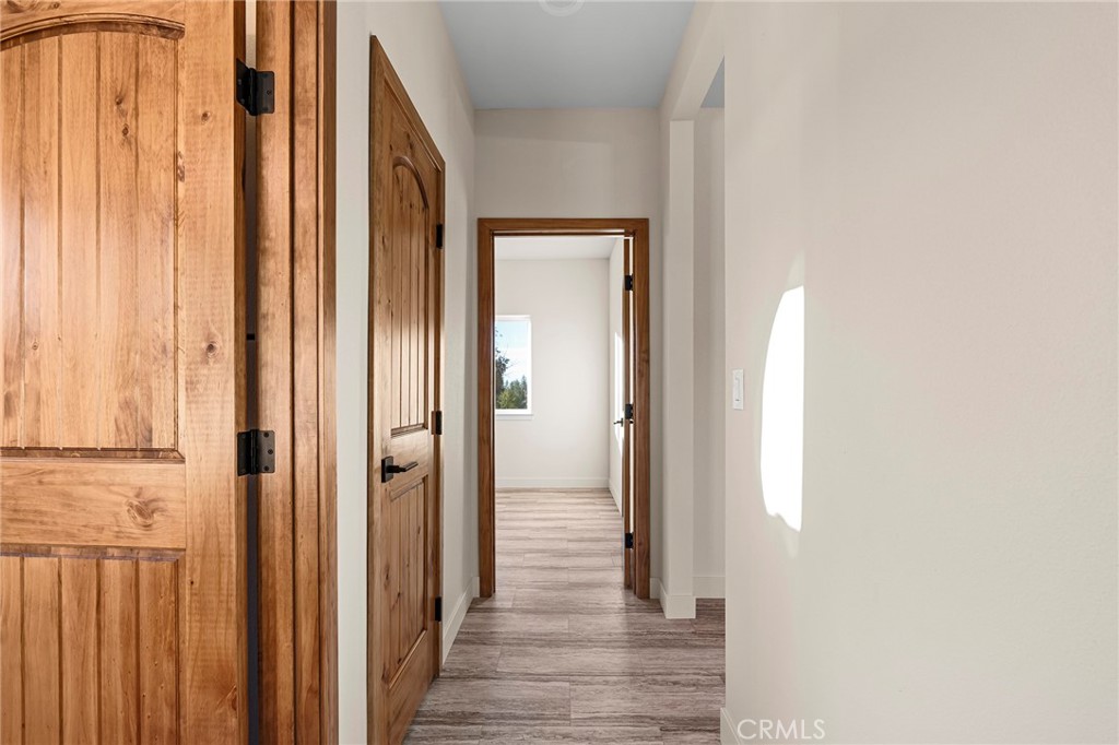 2235 Stearns Road Paradise, CA 95969 - Photo 23 of 42 a view of a hallway with wooden floor