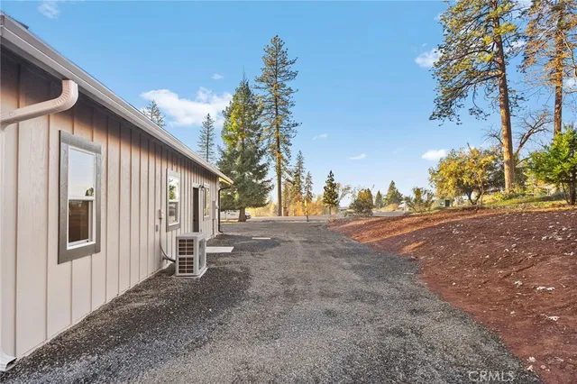 a view of a yard in front of the house