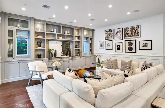 a view of a swimming pool with a patio and a yard