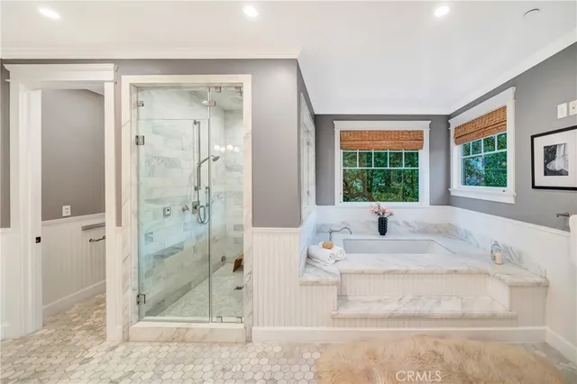 a view of a chairs and table in the backyard