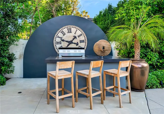 a bathroom with a tub a window and a shower