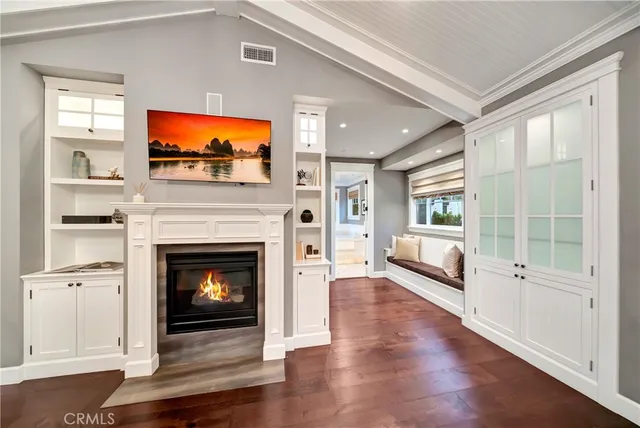 a spacious bedroom with a balcony a bed and a couch