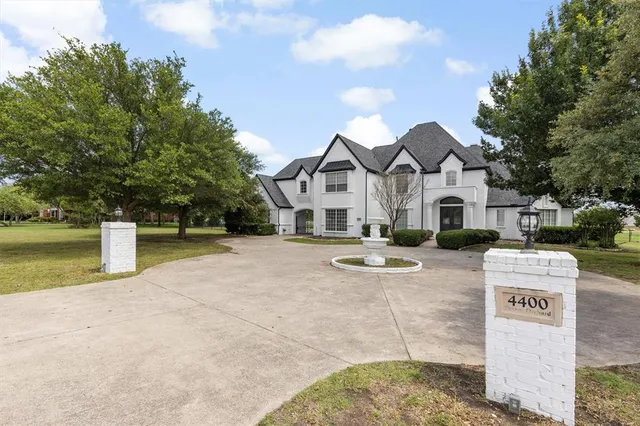 a front view of a house with yard