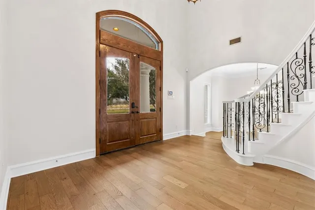 a view of a hallway view with staircase