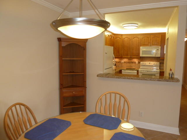 22795 Southwest 66th Avenue, Unit 104 Boca Raton, FL 33428 - Photo 6 of 18 Dining Room & Kitchen