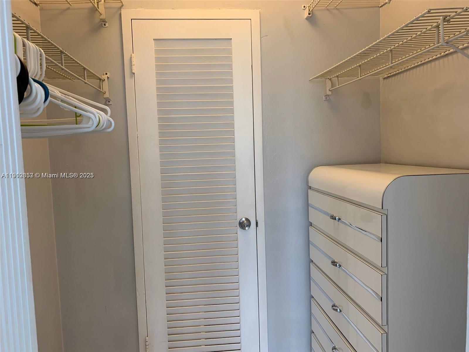 100 Lincoln Road, Unit 638 Miami Beach, FL 33139 - Photo 13 of 26 a utility room with dryer and washer