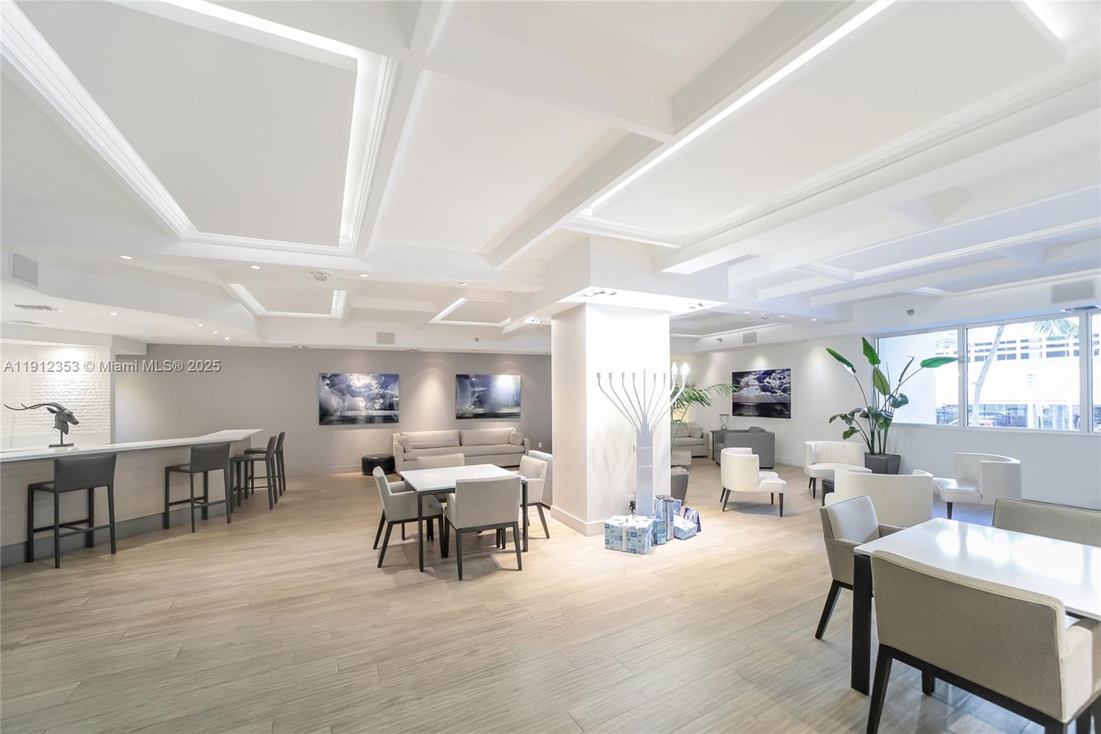 100 Lincoln Road, Unit 638 Miami Beach, FL 33139 - Photo 24 of 26 a living room with lots of furniture and a large window