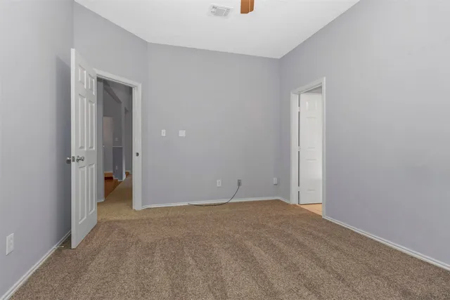 a bathroom with a bathtub and a sink