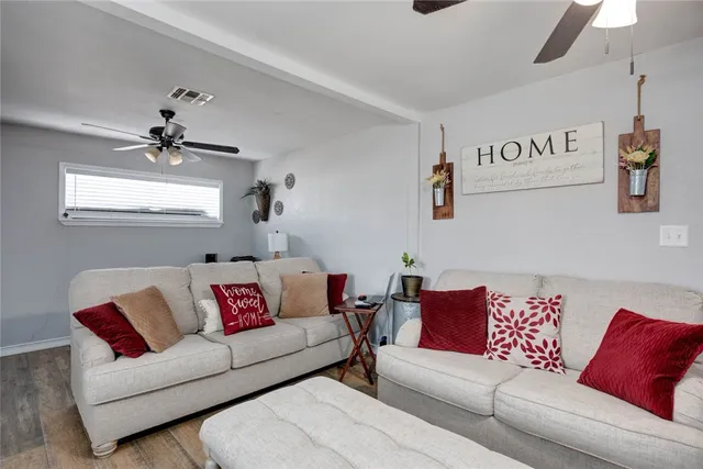 a living room with furniture and a couch