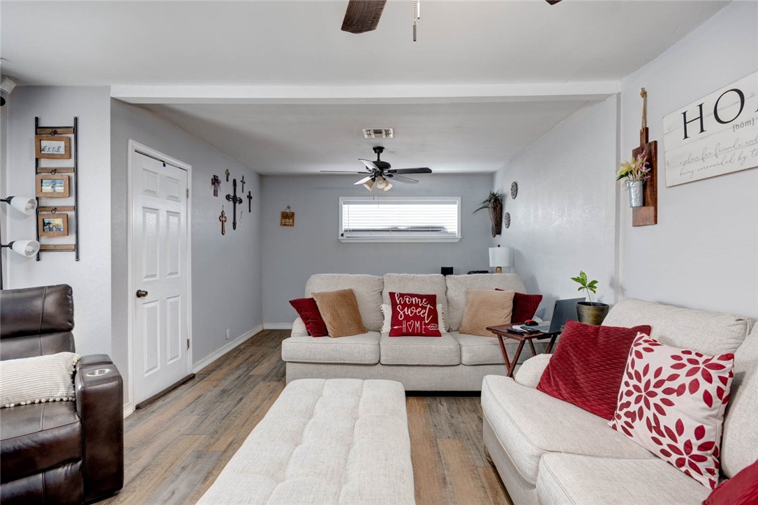 3906 Barnes Street Corpus Christi, TX 78415 - Photo 3 of 12 a living room with furniture and a rug