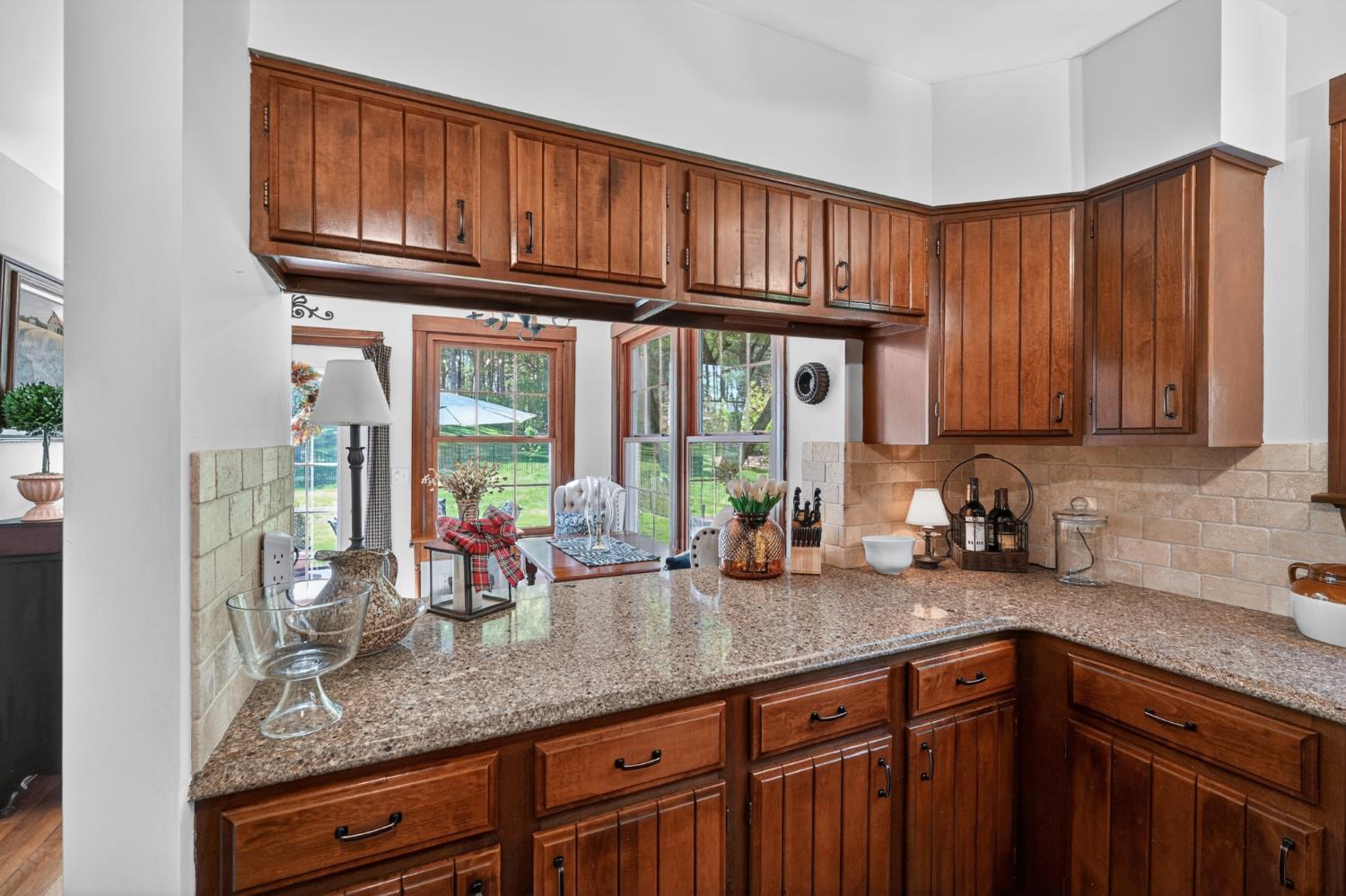 2179 Webb Road Brookville, IN 47012 - Photo 20 of 84 The kitchen pass-thru opens to an inviting breakfast nook. Lots of quartz countertops for serving.