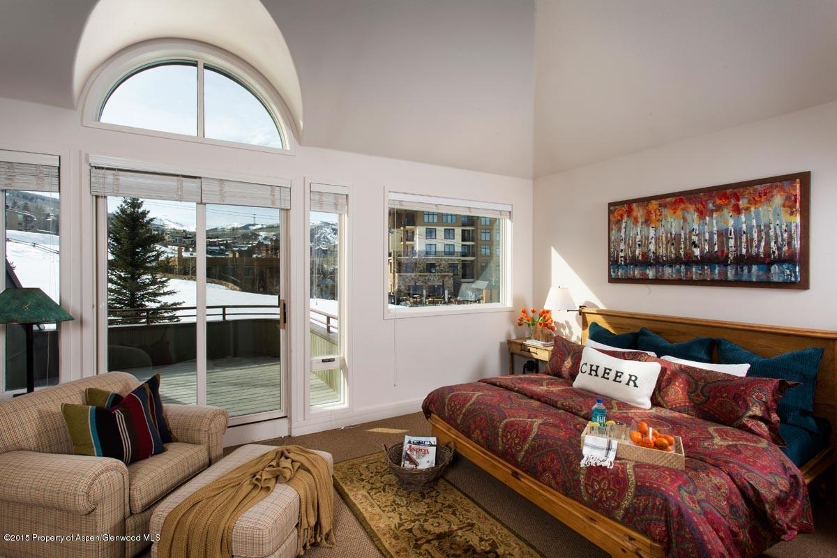 381 Ridge Road, Unit B3 Snowmass Village, CO 81615 - Photo 7 of 18 a bedroom with bed and balcony