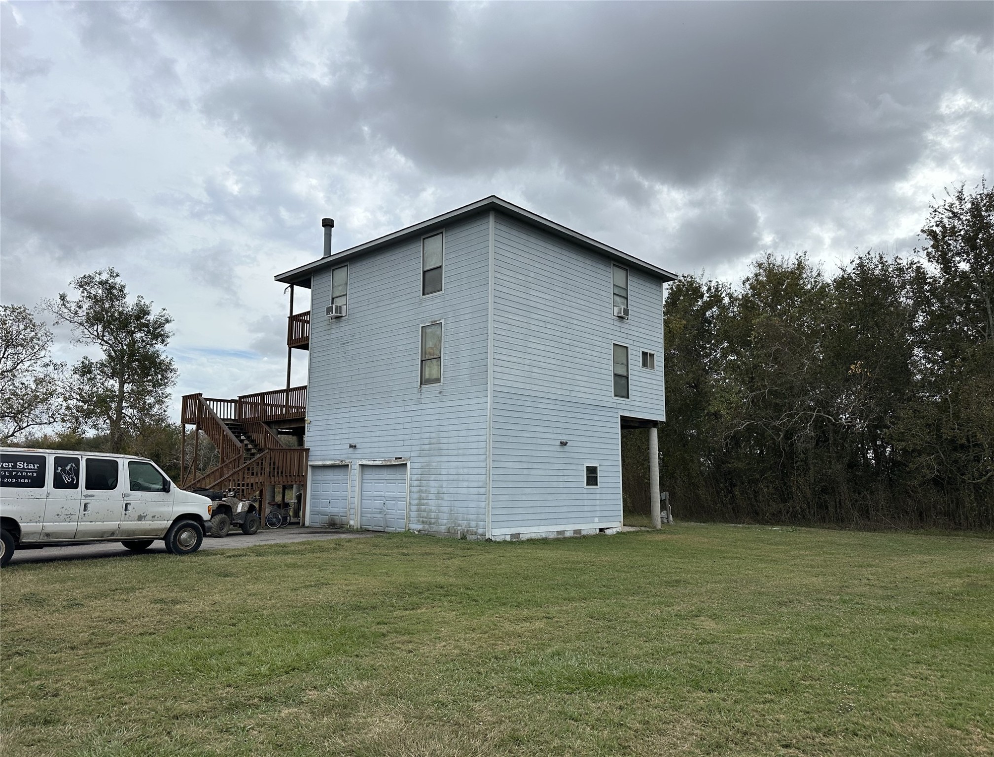 13803 Norris Road Rosharon, TX 77583 - Photo 13 of 29 a view of a house with a yard