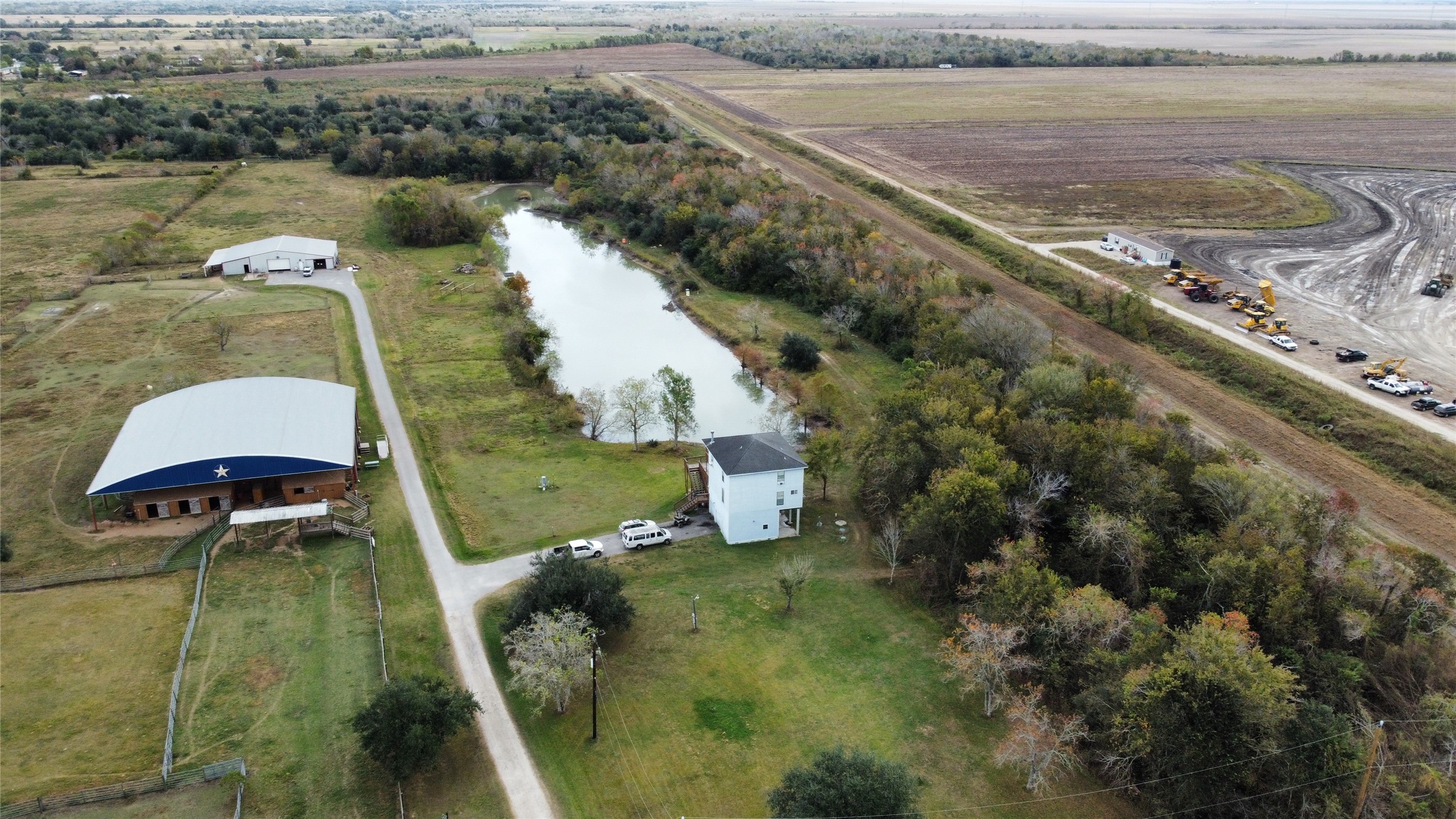 13803 Norris Road Rosharon, TX 77583 - Photo 4 of 29 a view of a lake with a mountain