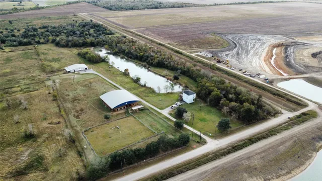 a view of swimming pool with a yard and seating space