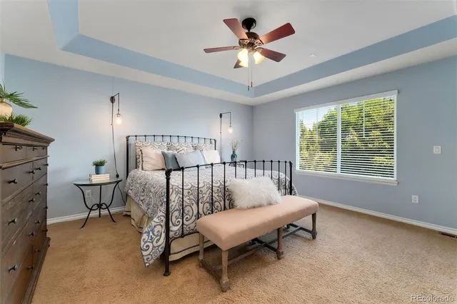 a bed room with a bed and a window