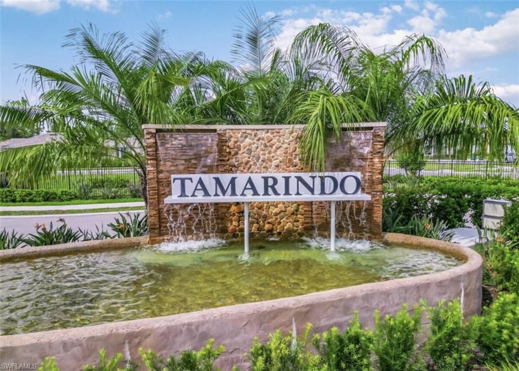 Community / neighborhood sign with fence