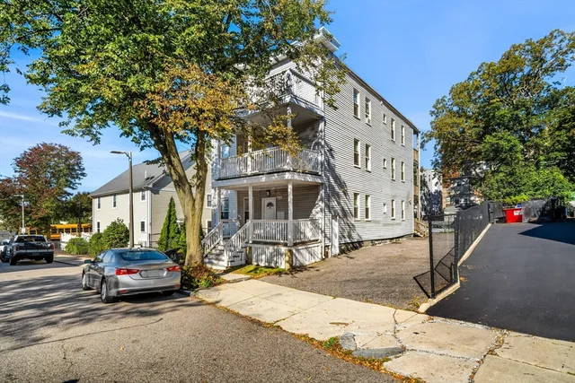 a car parked on the side of a street