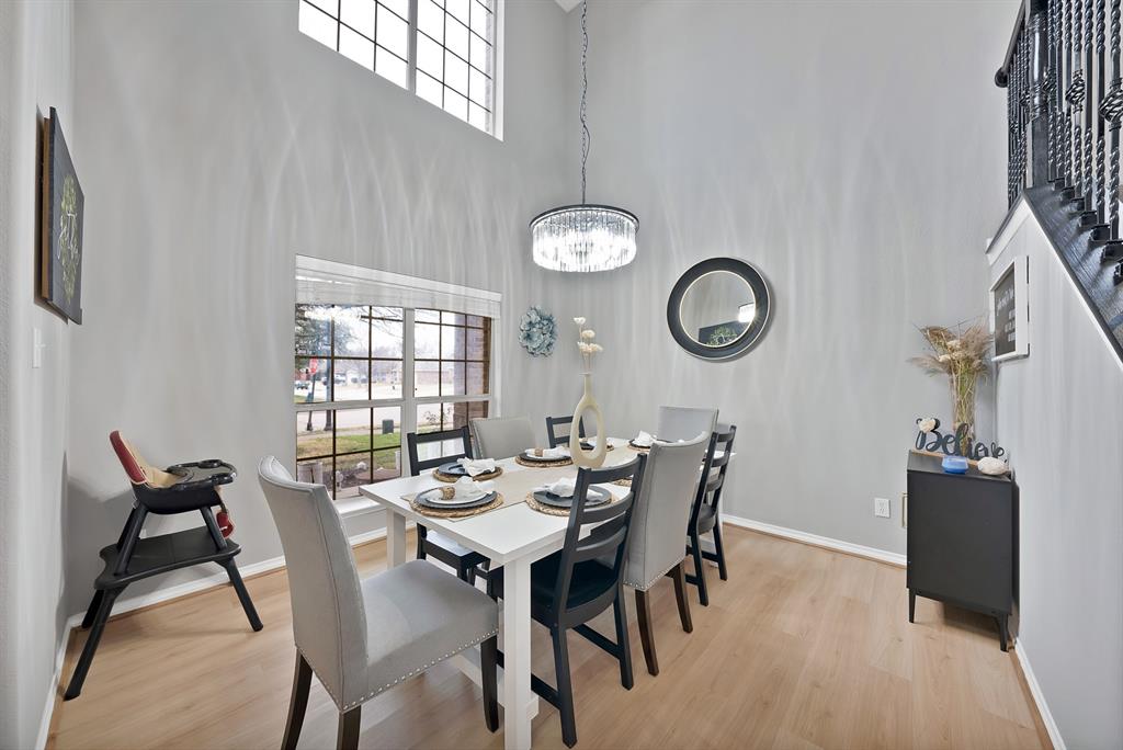 3822 Spring Run Lane Melissa, TX 75454 - Photo 4 of 39 a view of a dining room with furniture and chandelier