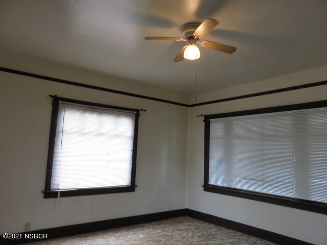 313 West Walnut Avenue Lompoc, CA 93436 - Photo 2 of 12 an empty room with a window