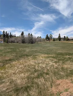 a view of an outdoor space with mountain view
