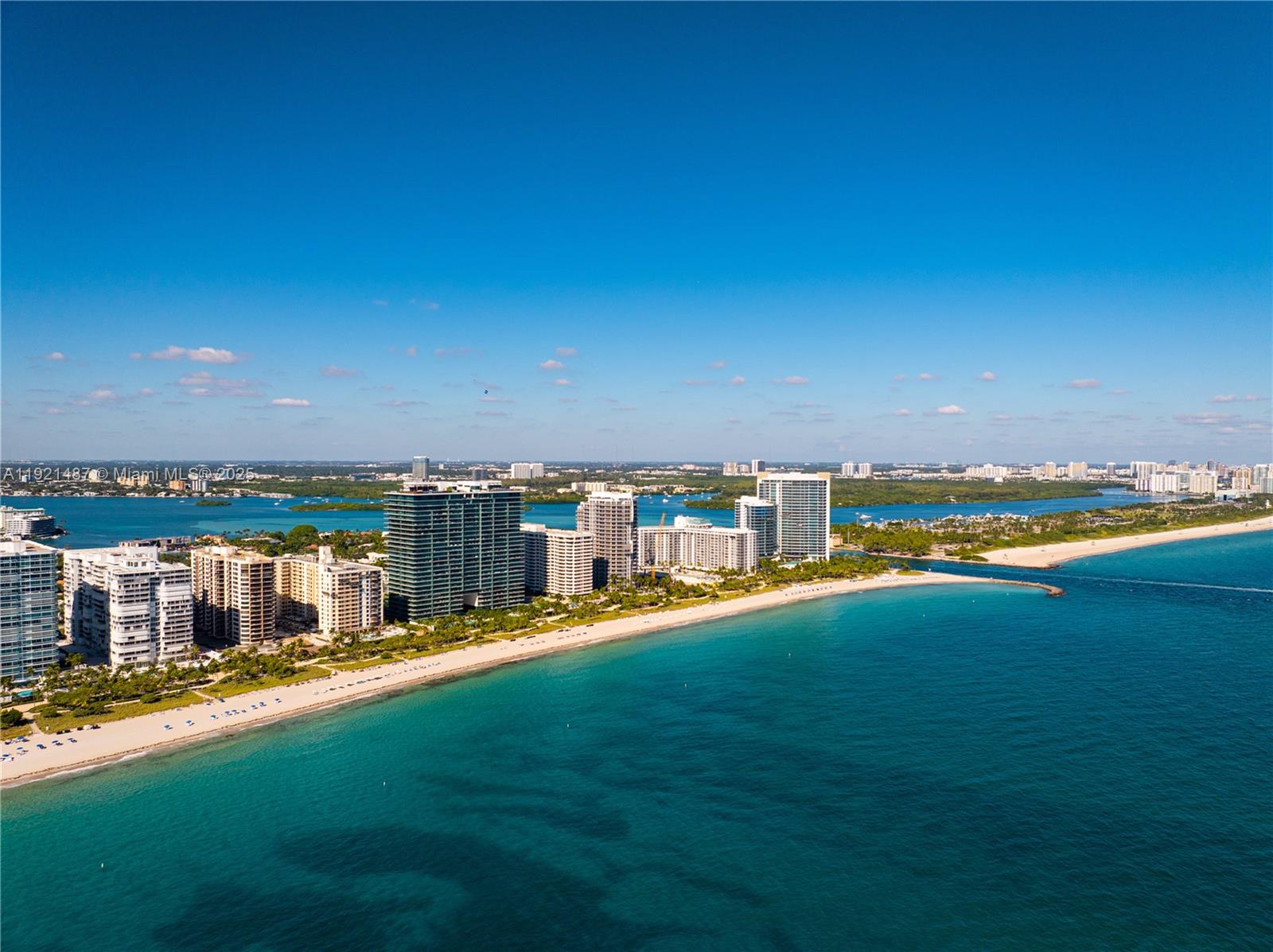10155 Collins Avenue, Unit 202 Bal Harbour, FL 33154 - Photo 2 of 50 a view of a lake with a big yard