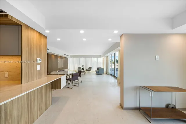 a kitchen that has a sink and a stove in it