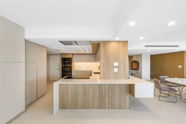 a bathroom with a double vanity sink and mirror