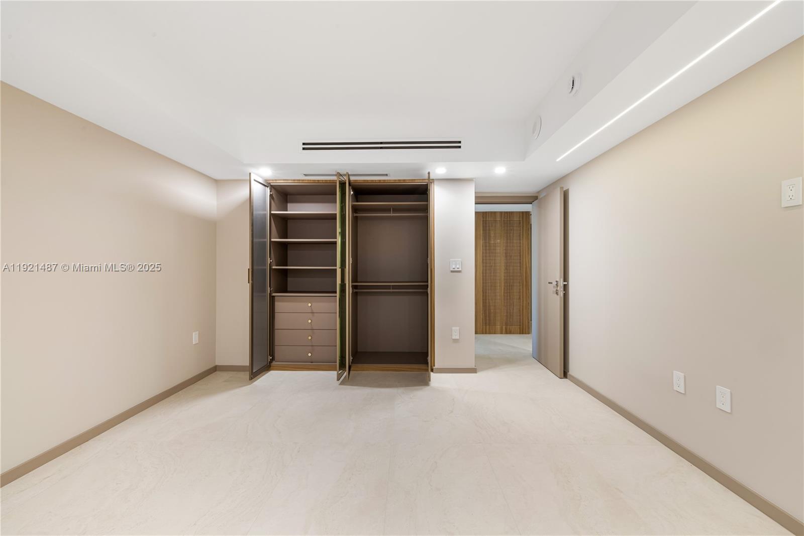 10155 Collins Avenue, Unit 202 Bal Harbour, FL 33154 - Photo 45 of 50 a view of an empty room