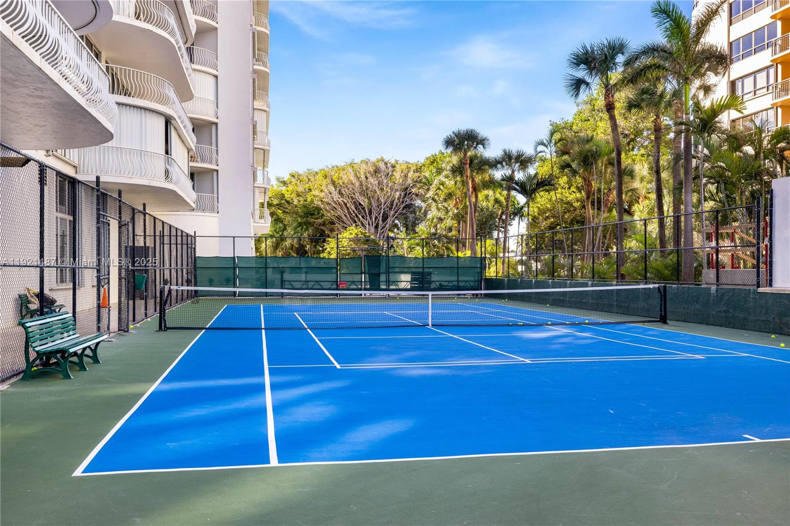 10155 Collins Avenue, Unit 202 Bal Harbour, FL 33154 - Photo 5 of 50 a view of yard tennis court