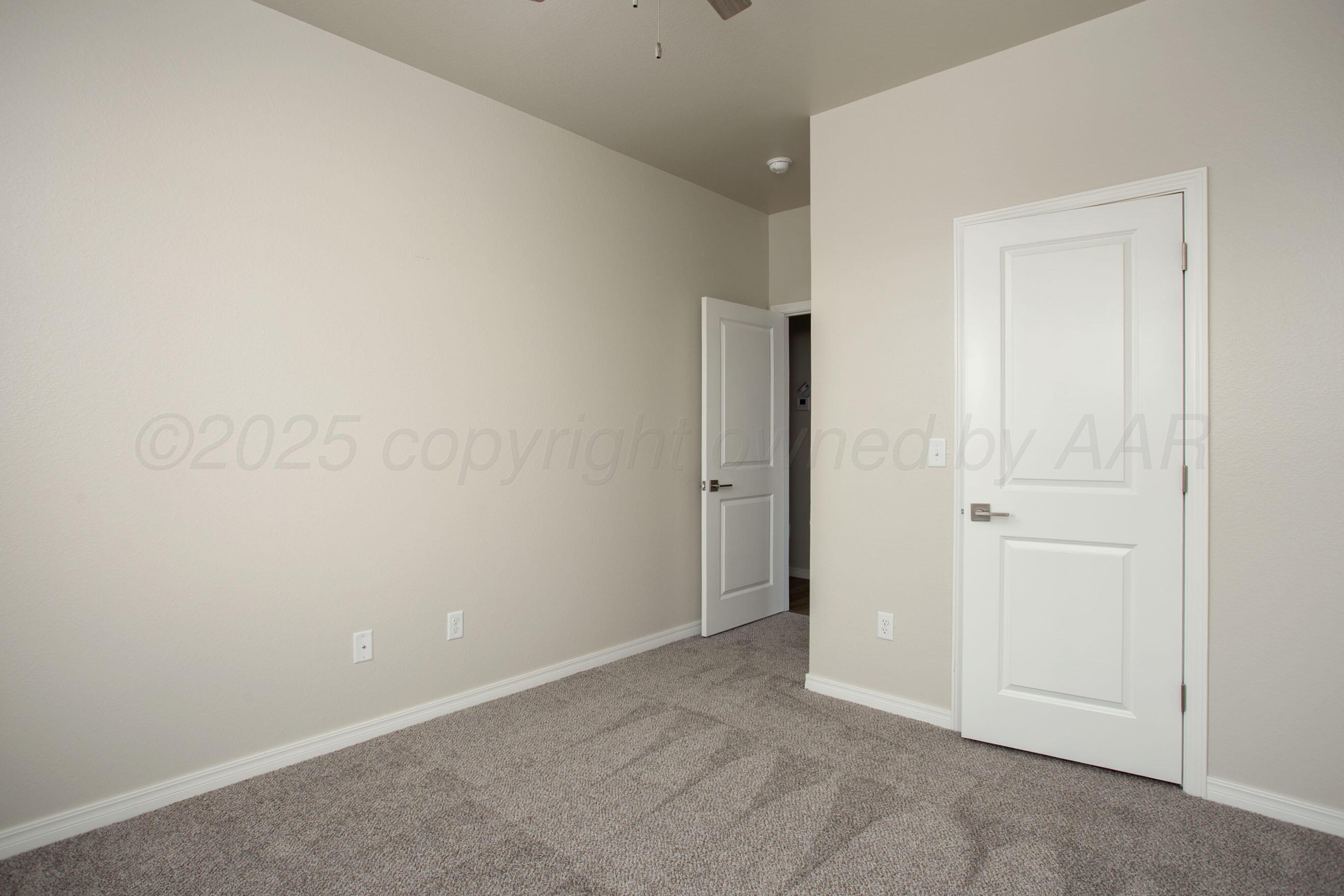 22111 Howard Draw Road Canyon, TX 79015 - Photo 19 of 25 an empty room with closet area