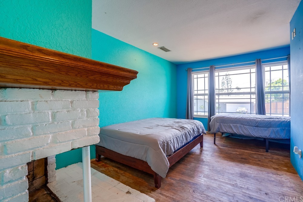 612 Lyford Drive La Verne, CA 91750 - Photo 24 of 44 a bedroom with a bed and a window