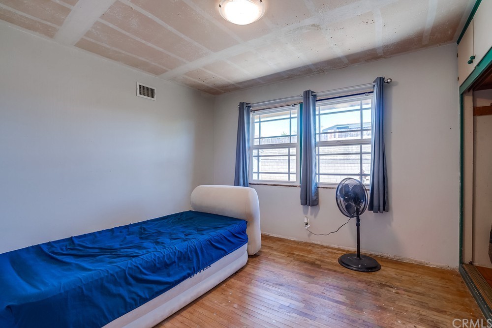 612 Lyford Drive La Verne, CA 91750 - Photo 26 of 44 a bedroom with bed and window