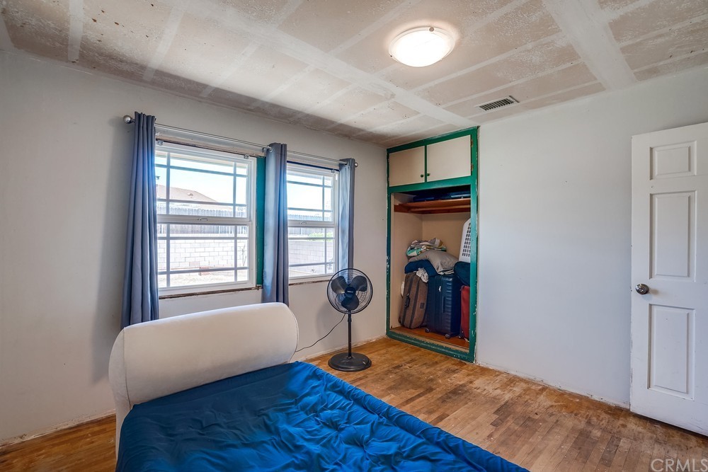 612 Lyford Drive La Verne, CA 91750 - Photo 28 of 44 a bedroom with furniture and a window