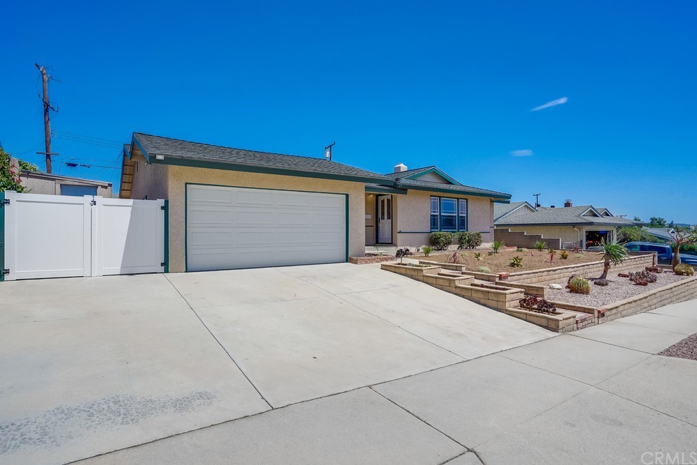 612 Lyford Drive La Verne, CA 91750 - Photo 5 of 44 a large parking space with lots of appliances and brick walls