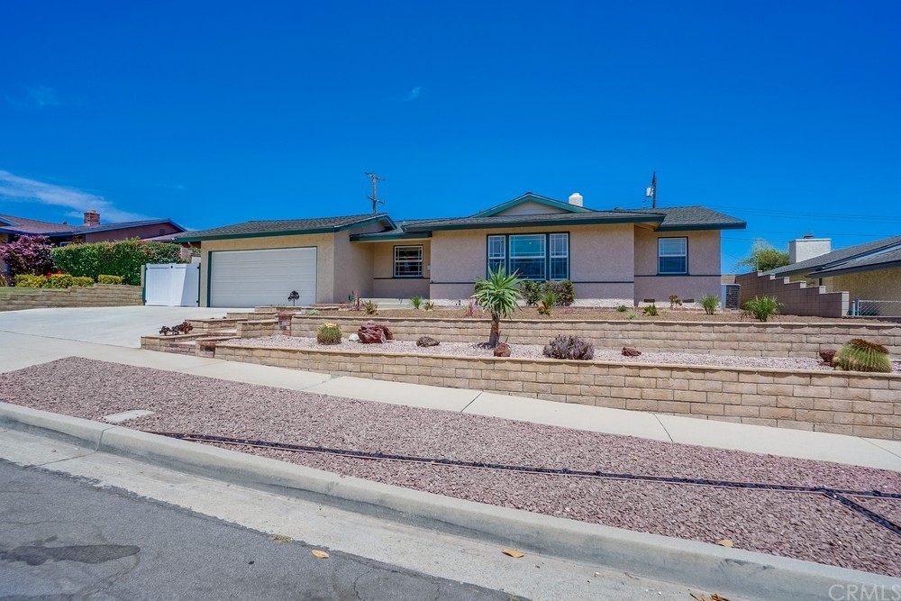 612 Lyford Drive La Verne, CA 91750 - Photo 6 of 44 a backyard of a house with yard and outdoor seating