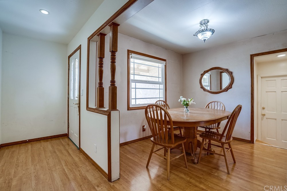 612 Lyford Drive La Verne, CA 91750 - Photo 7 of 44 a view of a dining room with furniture and wooden floor