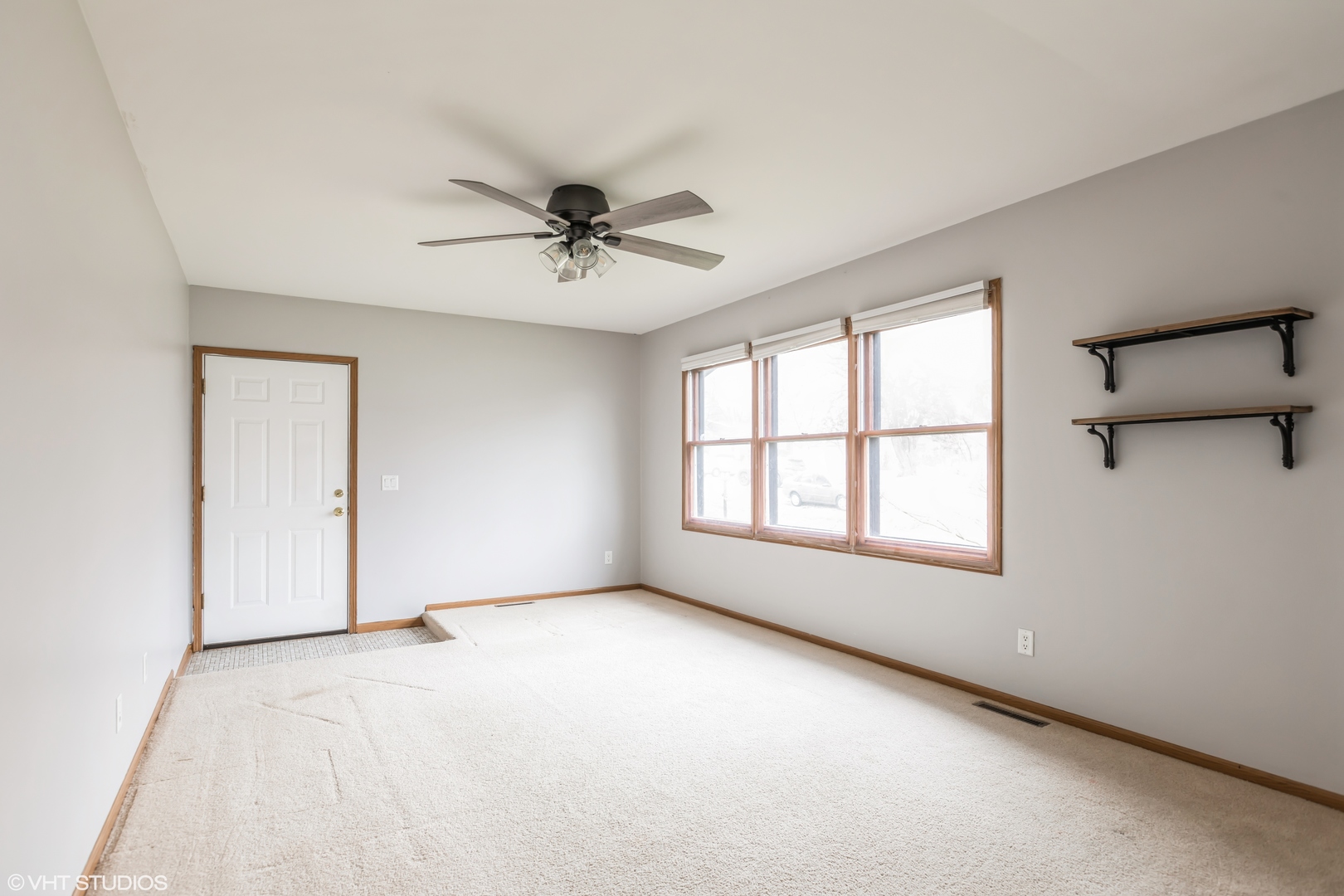 5 Hunters Path Lake In The Hills, IL 60156 - Photo 8 of 20 a view of an empty room with a window