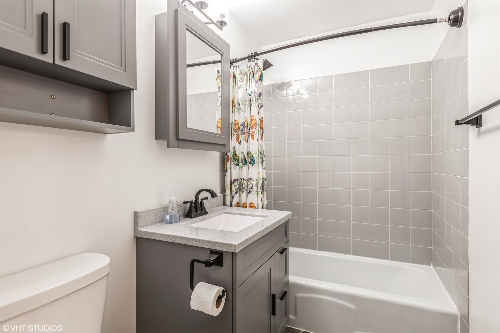 5 Hunters Path Lake In The Hills, IL 60156 - Photo 9 of 20 a bathroom with a sink a toilet and shower