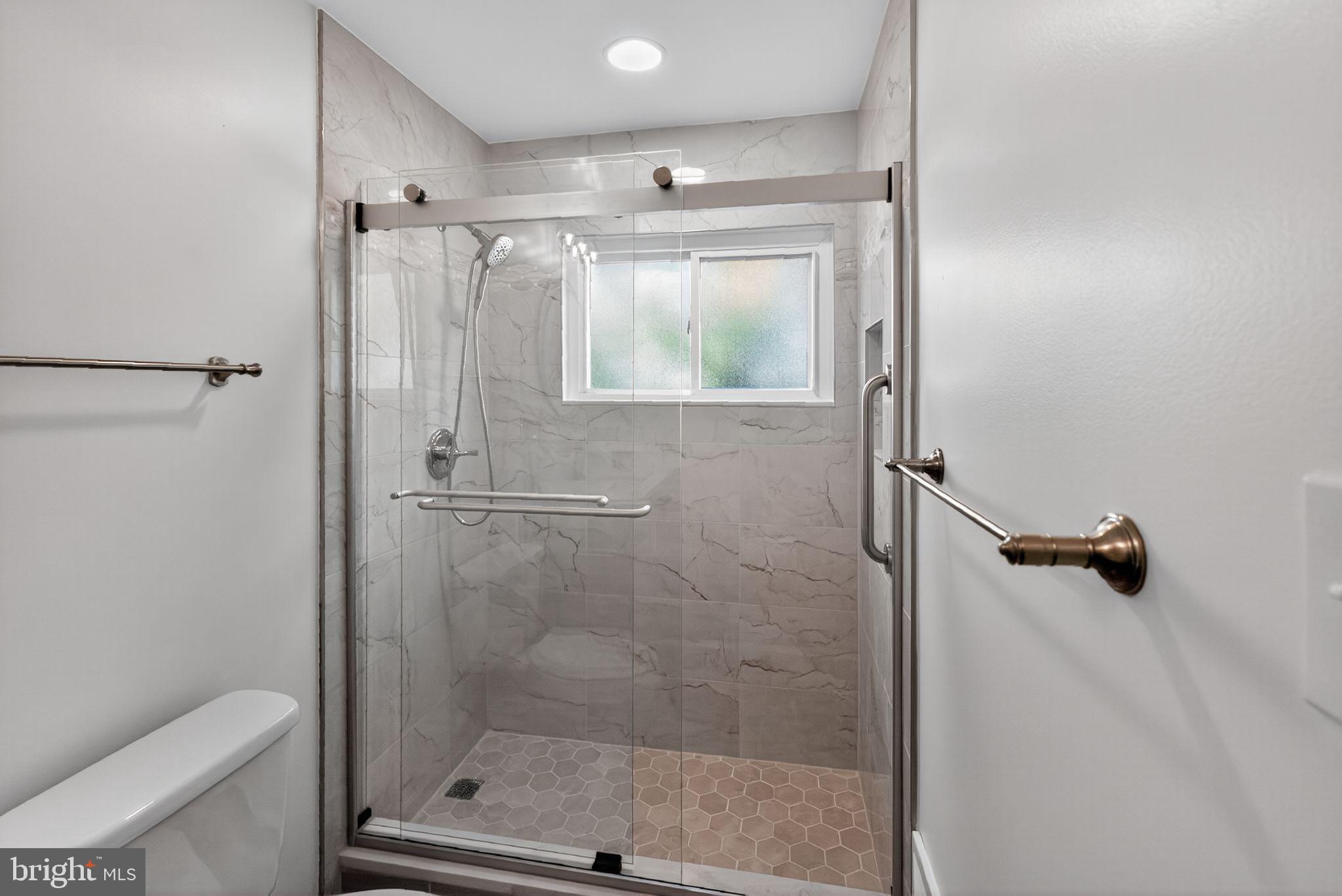 20 Hillside Road Greenbelt, MD 20770 - Photo 16 of 22 a bathroom with a shower