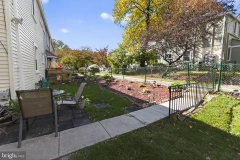 a view of a park with seating area